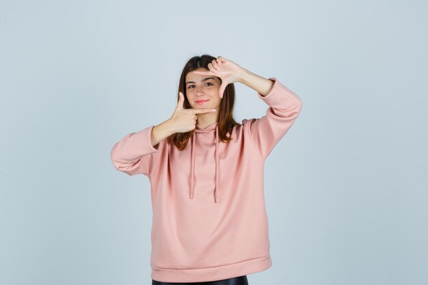 Expressive young lady posing in the studio