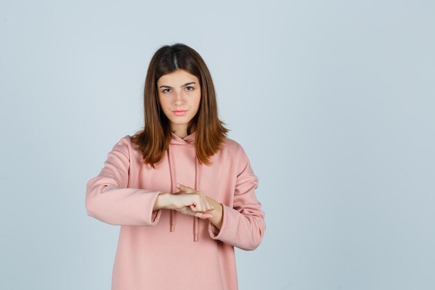 Expressive young lady posing in the studio