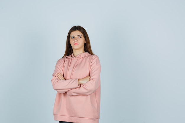 Expressive young lady posing in the studio