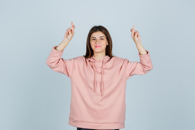 Expressive young lady posing in the studio