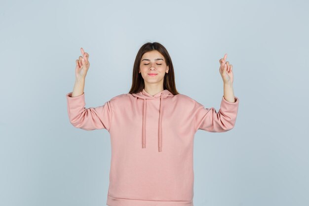 Expressive young lady posing in the studio