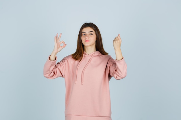 Expressive young lady posing in the studio