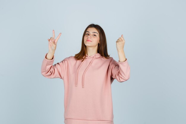 Expressive young lady posing in the studio