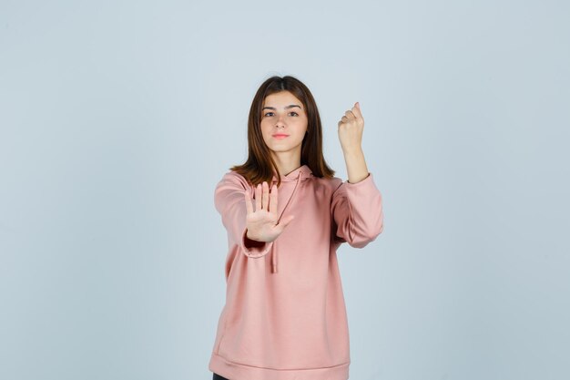 Expressive young lady posing in the studio