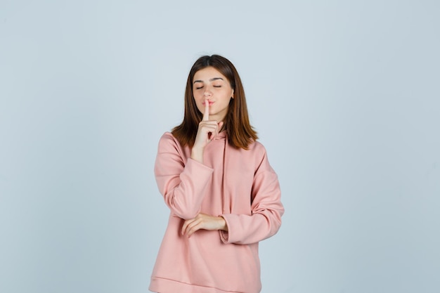 Expressive young lady posing in the studio