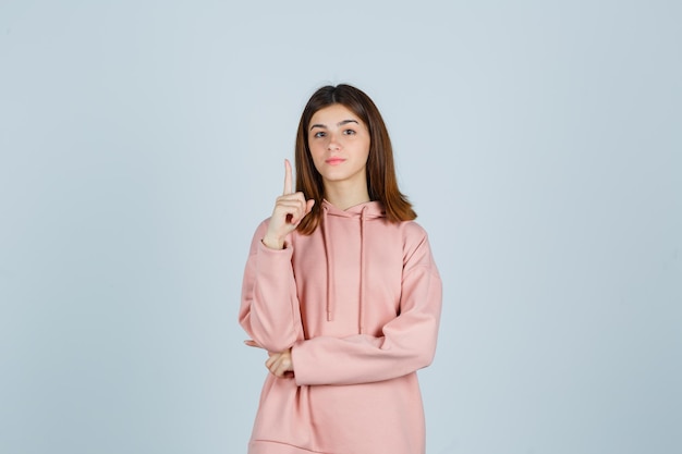 Expressive young lady posing in the studio