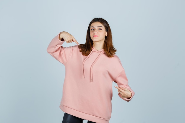 Expressive young lady posing in the studio