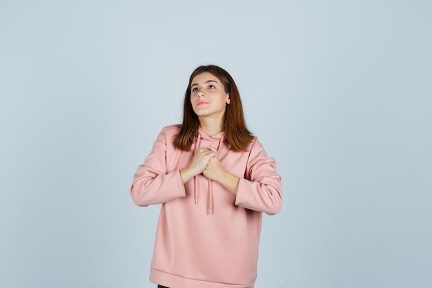 Expressive young lady posing in the studio