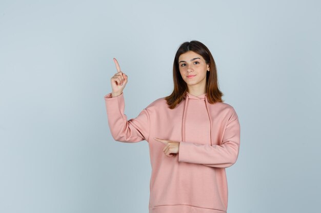 Expressive young lady posing in the studio