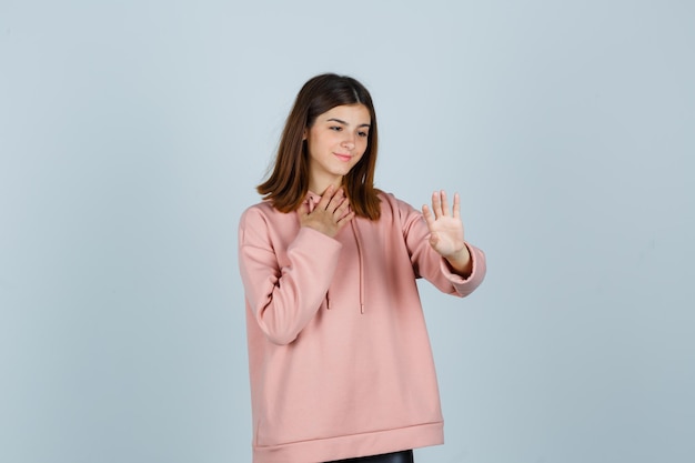 Expressive young lady posing in the studio