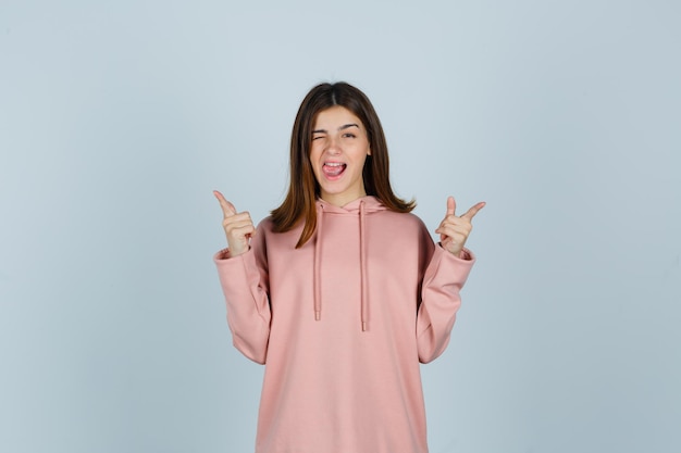 Expressive young lady posing in the studio