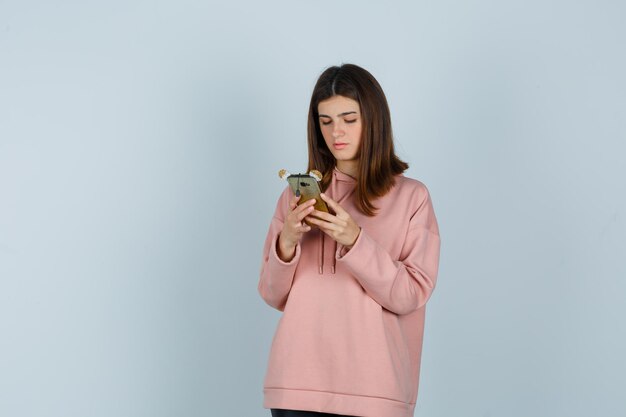 Expressive young lady posing in the studio