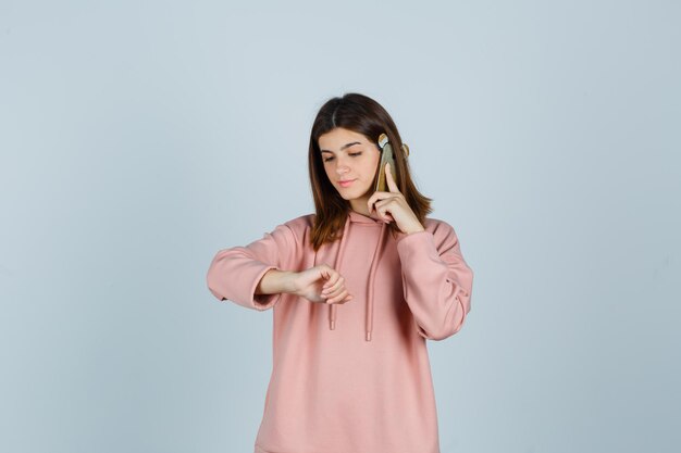 Expressive young lady posing in the studio