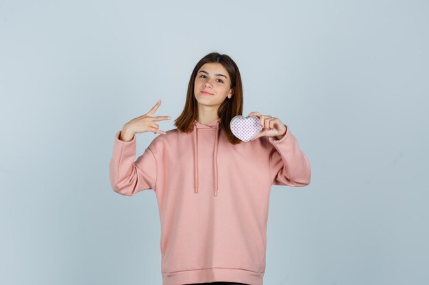 Expressive young lady posing in the studio