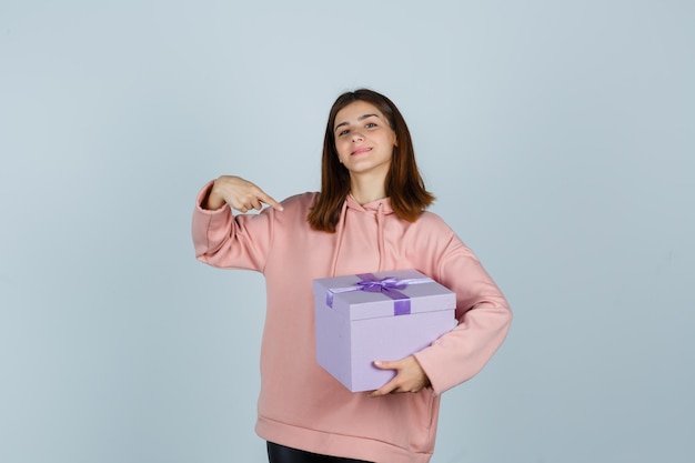 Expressive young lady posing in the studio