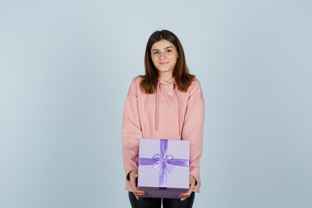 Expressive young lady posing in the studio