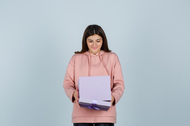 Expressive young lady posing in the studio