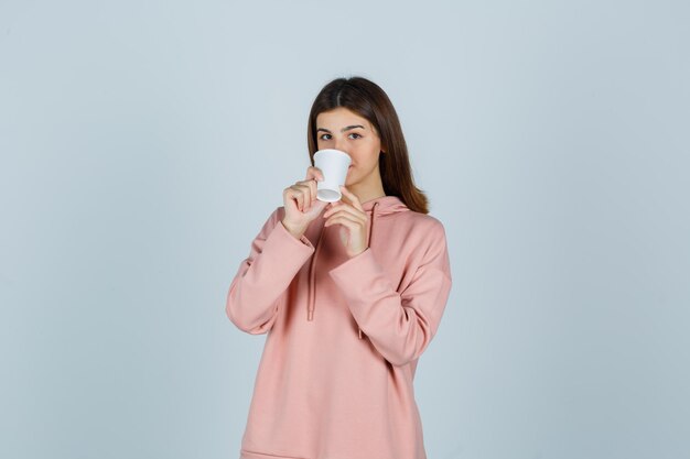 Expressive young lady posing in the studio