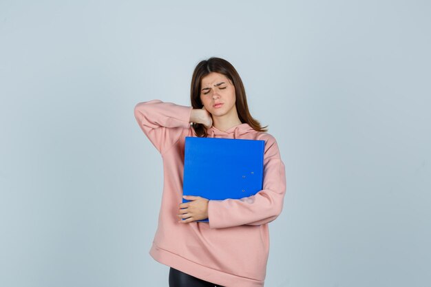 Expressive young lady posing in the studio