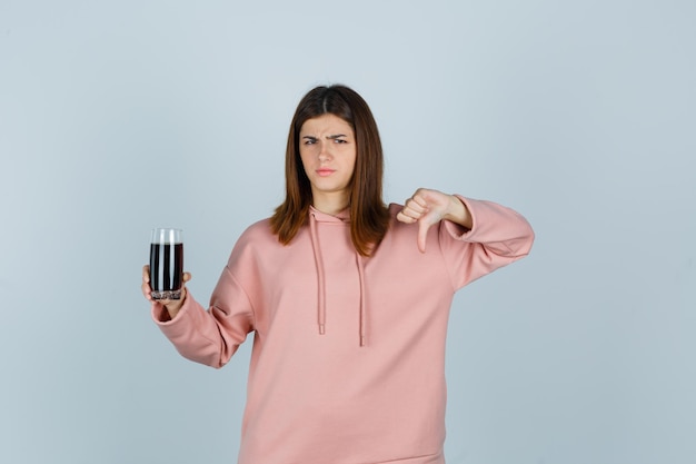 Expressive young lady posing in the studio