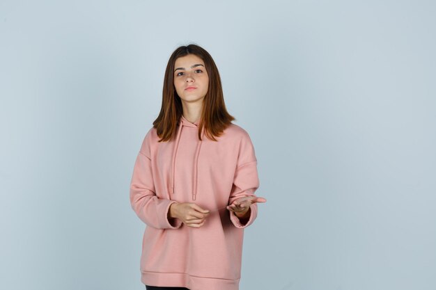 Expressive young lady posing in the studio