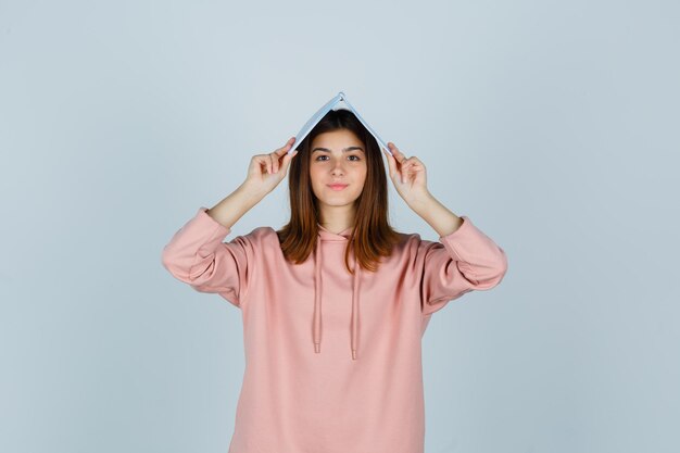 Expressive young lady posing in the studio