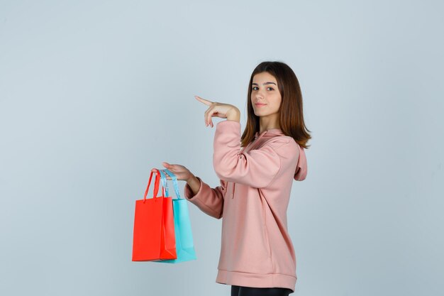 Expressive young lady posing in the studio