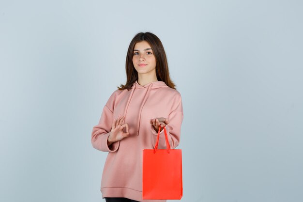 Expressive young lady posing in the studio