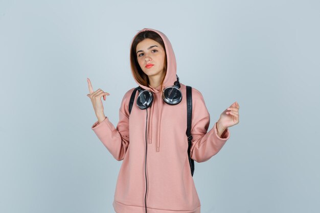 Expressive young lady posing in the studio