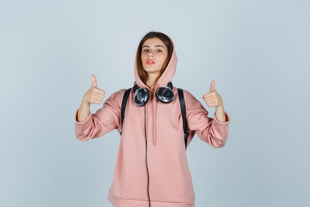 Expressive young lady posing in the studio