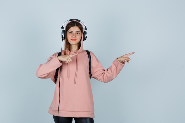 Expressive young lady posing in the studio