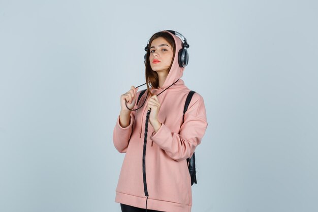 Expressive young lady posing in the studio