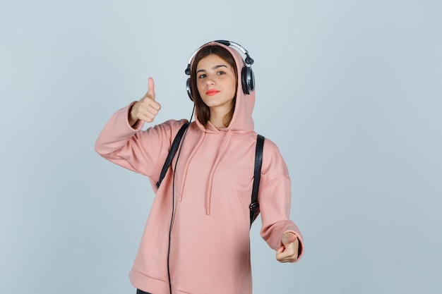 Expressive young lady posing in the studio