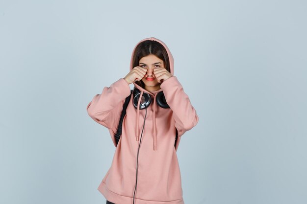 Expressive young lady posing in the studio