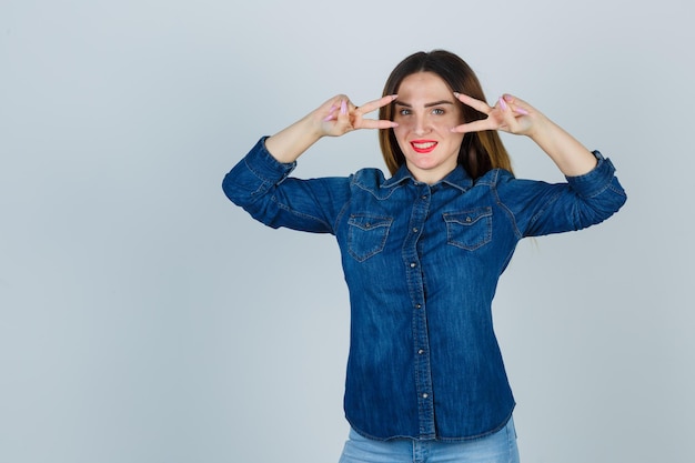 Expressive young lady posing in the studio