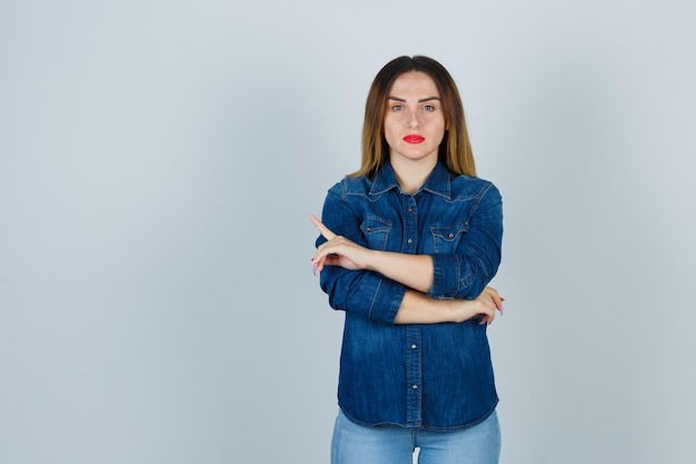 Expressive young lady posing in the studio