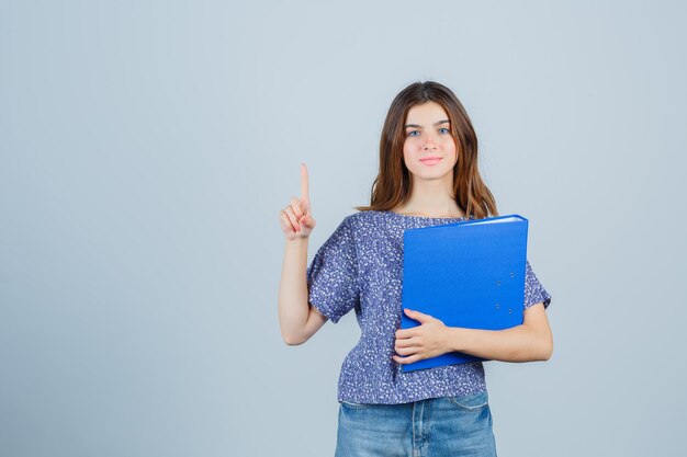 Expressive young lady posing in the studio