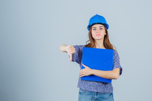 Expressive young lady posing in the studio