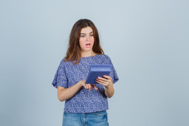 Expressive young lady posing in the studio