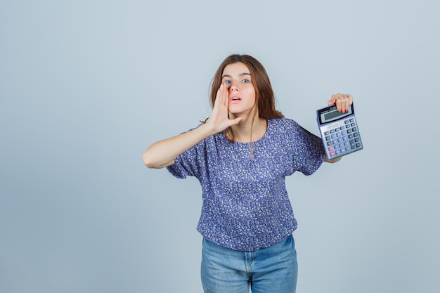 Expressive young lady posing in the studio