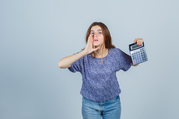 Expressive young lady posing in the studio