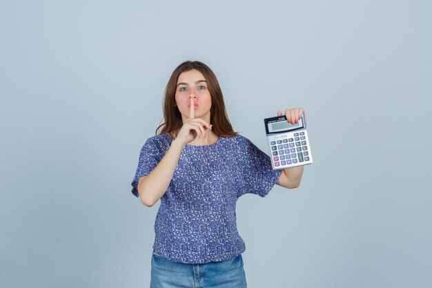 Expressive young lady posing in the studio