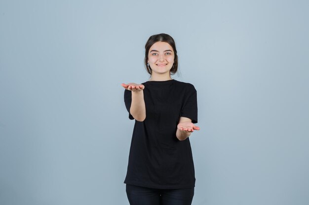 Expressive young lady posing in the studio