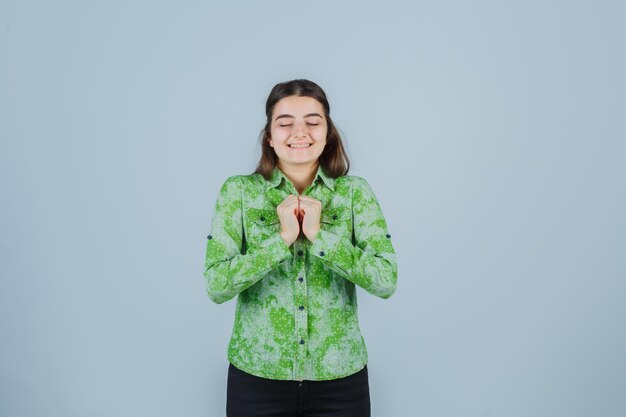 Expressive young lady posing in the studio