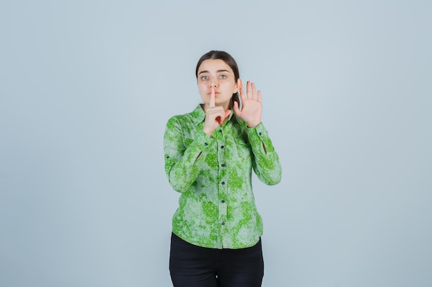 Expressive young lady posing in the studio