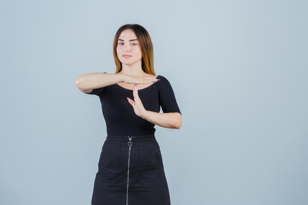 Expressive young lady posing in the studio