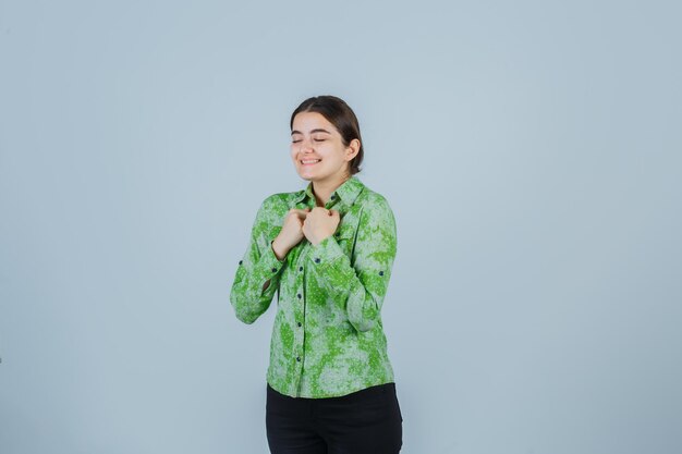 Expressive young lady posing in the studio