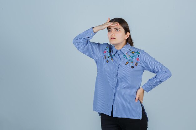 Expressive young lady posing in the studio