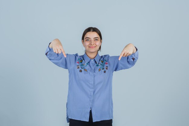 Expressive young lady posing in the studio