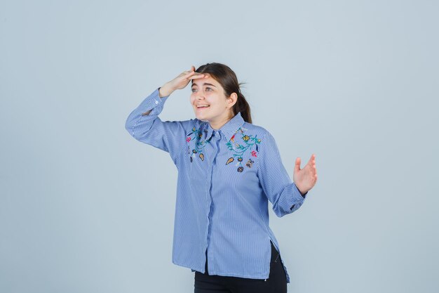 Expressive young lady posing in the studio